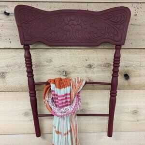 Upcycled wooden chair as a towel hook